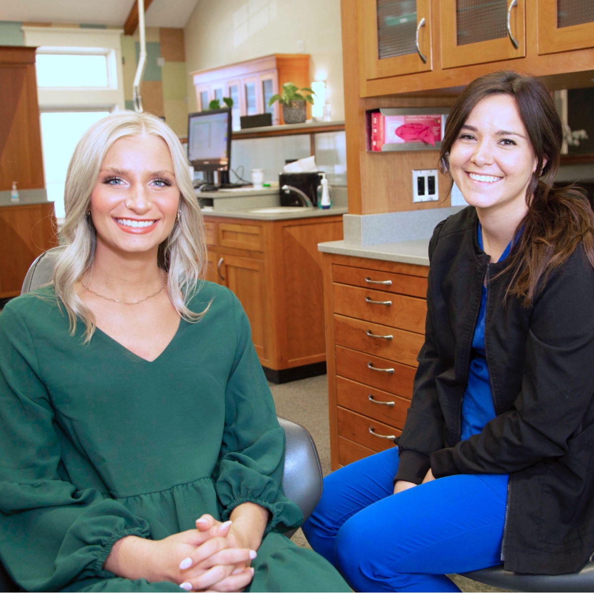 adult patient and team member smiling during visit